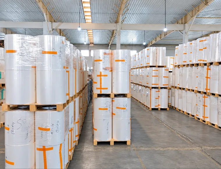 Warehouse with palletised rolls of Renature packaging film