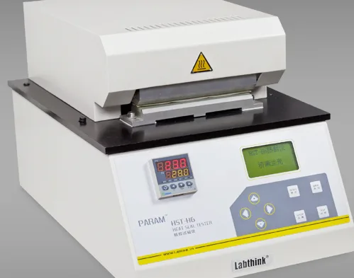 Lab bench with the gradient heat-seal tester and a tear tester